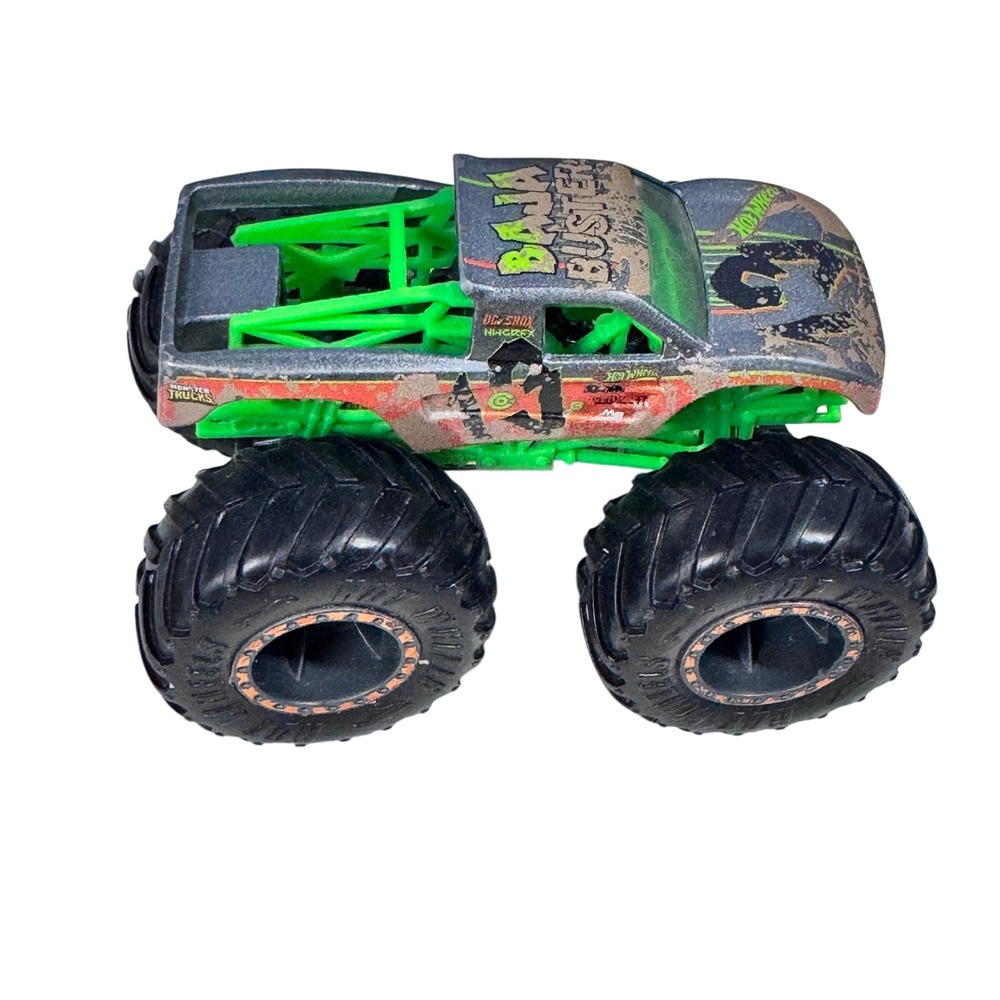 Hot Wheels Baja Buster Monster Truck Diecast Toy‎ Green Orange Mud Splatter